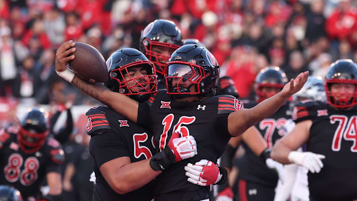 Utah Utes quarterback Byrd Ficklin (15) celebrates a touchdown against the Kansas State Wildcats during the second half at Rice-Eccles Stadium.