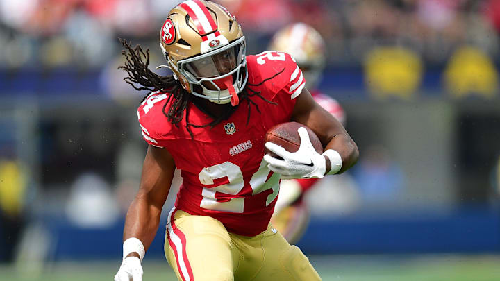 Sep 22, 2024; Inglewood, California, USA; San Francisco 49ers running back Jordan Mason (24) runs the ball against the Los Angeles Rams during the first half at SoFi Stadium.