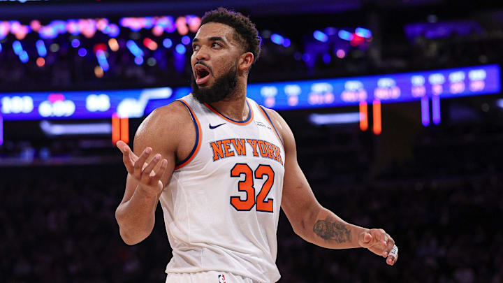 Jan 1, 2025; New York, New York, USA; New York Knicks center Karl-Anthony Towns (32) reacts during the second half against the Utah Jazz at Madison Square Garden. Mandatory Credit: Vincent Carchietta-Imagn Images