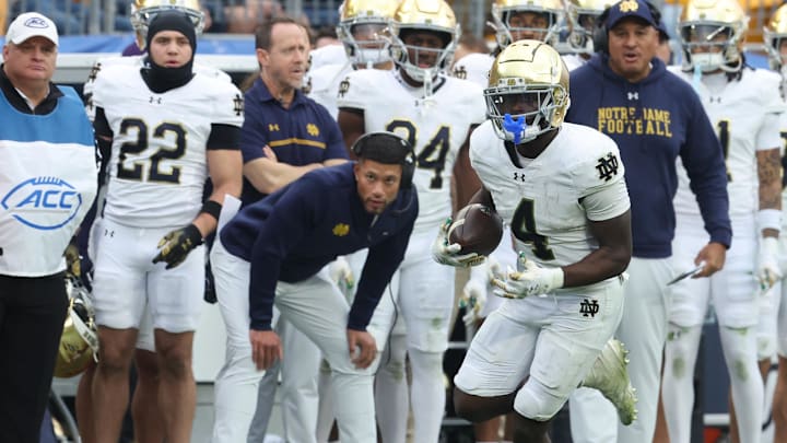 Nov 15, 2025; Pittsburgh, Pennsylvania, USA; Notre Dame Fighting Irish running back Jeremiyah Love (4) runs the ball against the Pittsburgh Panthers during the fourth quarter at Acrisure Stadium. Mandatory Credit: Charles LeClaire-Imagn Images Nov 15, 2025; Pittsburgh, Pennsylvania, USA; Notre Dame Fighting Irish running back Jeremiyah Love (4) runs the ball against the Pittsburgh Panthers during the fourth quarter at Acrisure Stadium. Mandatory Credit: Charles LeClaire-Imagn Images