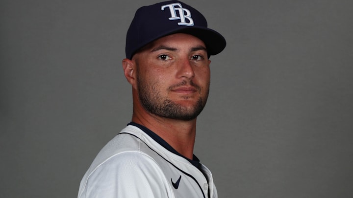 Feb 19, 2026; PortCharlotte, FL, USA; Tampa Bay Rays pitcher Shane McClanahan (18) poses for a photo during media day Feb 19, 2026; PortCharlotte, FL, USA; Tampa Bay Rays pitcher Shane McClanahan (18) poses for a photo during media day