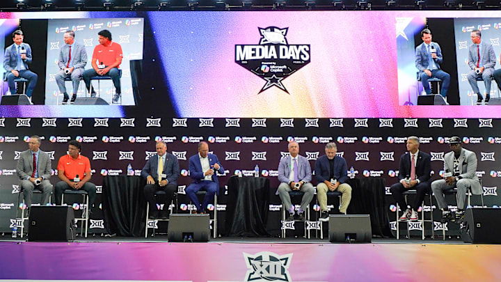 Jul 9, 2025; Frisco, TX, USA; Head coaches Willie Fritz of Houston, Mike Gundy of Oklahoma State, Rich Rodriguez of West Virginia, Lance Leipold of Kansas, Sonny Dykes of TCU, Kyle Whittingham of Utah, Brent Brennan of Arizona and Deion Sanders of Colorado all sit on stage for a Coaches Roundtable during 2025 Big 12 Football Media Days at The Star. Mandatory Credit: Raymond Carlin III-Imagn Images