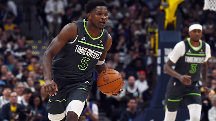 Apr 18, 2026; Denver, Colorado, USA; Minnesota Timberwolves guard Anthony Edwards (5) dribbles the ball up the court during the first half against the Denver Nuggets in game one of the first round of the 2026 NBA Playoffs at Ball Arena. Mandatory Credit: Christopher Hanewinckel-Imagn Images