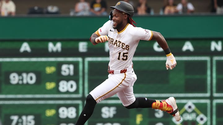 Jul 19, 2025; Pittsburgh, Pennsylvania, USA;  Pittsburgh Pirates center fielder Oneil Cruz (15) runs the bases on a triple against the Chicago White Sox during the second inning at PNC Park. Mandatory Credit: Charles LeClaire-Imagn Images