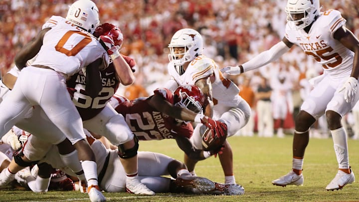 Sep 11, 2021; Fayetteville, Arkansas, USA; Arkansas Razorbacks running back Trelon Smith (22) scores a touchdown against the Texas Longhorns in the second half at Donald W. Reynolds Razorback Stadium. Arkansas won 40-21. Mandatory Credit: Nelson Chenault-USA TODAY Sports