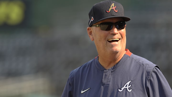 Atlanta Braves manager Brian Snitker (43) reacts during batting practice before the game against the Pittsburgh Pirates at PNC Park.