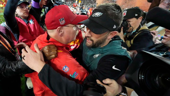 Kansas City Chiefs head coach Andy Reid and Philadelphia Eagles head coach Nick Sirianni greet each other after Super Bowl LVII at State Farm Stadium in 2023.