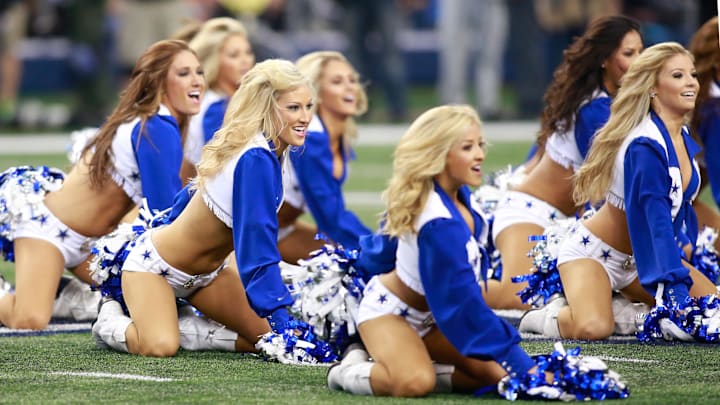 Dallas Cowboys cheerleaders perform during a NFL football game on Thanksgiving at AT&T Stadium.