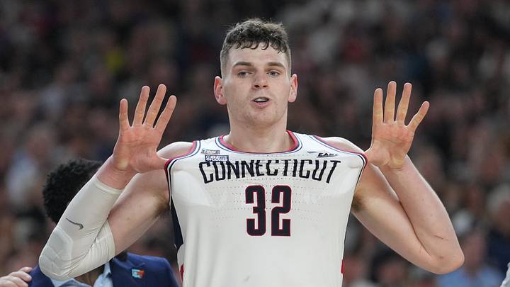 Apr 8, 2024; Glendale, AZ, USA; Connecticut Huskies center Donovan Clingan (32) celebrates defeating the Purdue Boilermakers in the national championship game of the Final Four of the 2024 NCAA Tournament at State Farm Stadium. Mandatory Credit: Robert Deutsch-USA TODAY Sports Apr 8, 2024; Glendale, AZ, USA; Connecticut Huskies center Donovan Clingan (32) celebrates defeating the Purdue Boilermakers in the national championship game of the Final Four of the 2024 NCAA Tournament at State Farm Stadium. Mandatory Credit: Robert Deutsch-USA TODAY Sports