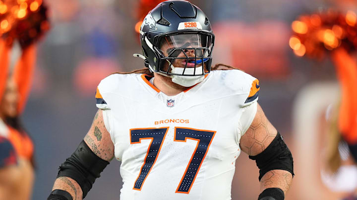 Aug 18, 2024; Denver, Colorado, USA; Denver Broncos guard Quinn Meinerz (77) before the game against the Green Bay Packers at Empower Field at Mile High. Mandatory Credit: Ron Chenoy-Imagn Images Aug 18, 2024; Denver, Colorado, USA; Denver Broncos guard Quinn Meinerz (77) before the game against the Green Bay Packers at Empower Field at Mile High. Mandatory Credit: Ron Chenoy-Imagn Images