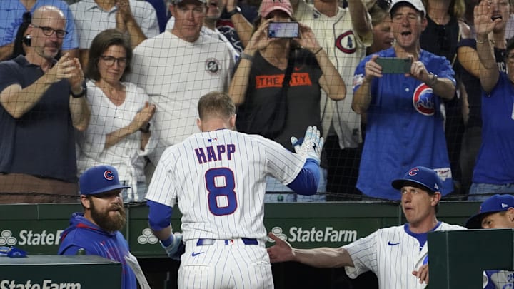Ian Happ walks back to the Chicago Cubs dugout. Ian Happ walks back to the Chicago Cubs dugout.