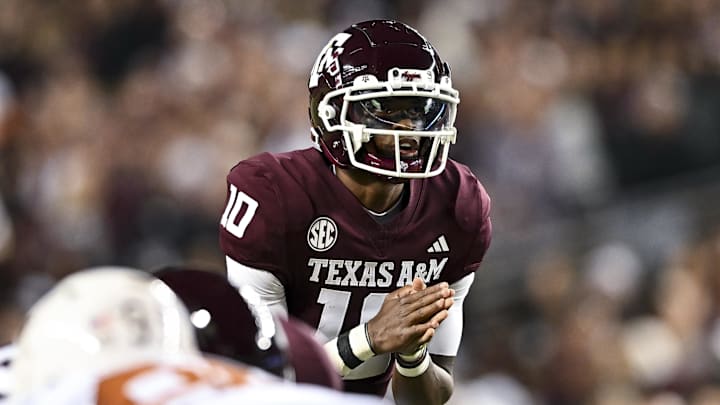 Nov 30, 2024; College Station, Texas, USA; Texas A&M Aggies quarterback Marcel Reed (10) calls a play during the first quarter against the Texas Longhorns. The Longhorns defeated the Aggies 17-7 at Kyle Field. Mandatory Credit: Maria Lysaker-Imagn Images Nov 30, 2024; College Station, Texas, USA; Texas A&M Aggies quarterback Marcel Reed (10) calls a play during the first quarter against the Texas Longhorns. The Longhorns defeated the Aggies 17-7 at Kyle Field. Mandatory Credit: Maria Lysaker-Imagn Images