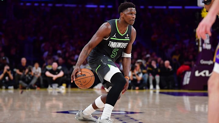 Apr 30, 2025; Los Angeles, California, USA; Minnesota Timberwolves guard Anthony Edwards (5) controls the ball against the Los Angeles Lakers during the second half in game five of first round for the 2025 NBA Playoffs at Crypto.com Arena. Mandatory Credit: Gary A. Vasquez-Imagn Images