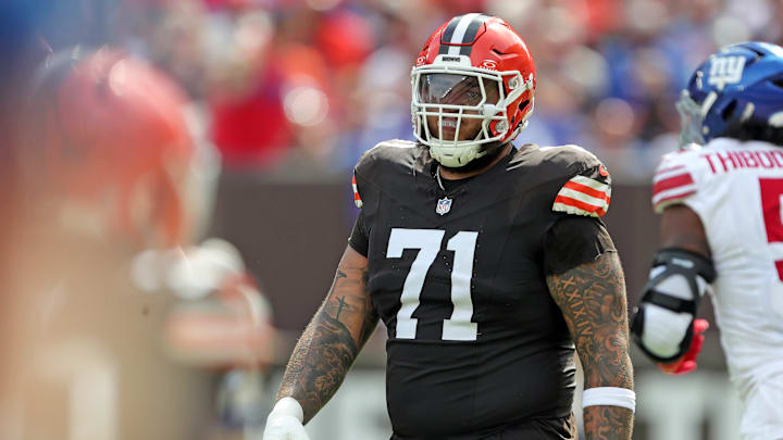 Cleveland Browns offensive tackle Jedrick Wills Jr. (71) heads back to the huddle after a play during the first half of an NFL football game against the New York Giants at Huntington Bank Field, Sunday, Sept. 22, 2024, in Cleveland, Ohio.