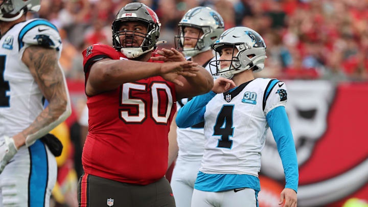 Tampa Bay Buccaneers defensive tackle Vita Vea (50) reacts after Carolina Panthers place kicker Eddy Pineiro (4) misses an extra point during the second quarter at Raymond James Stadium. 