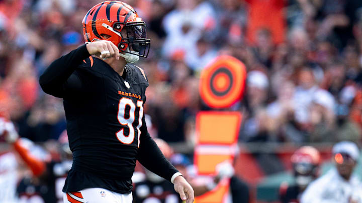 Cincinnati Bengals defensive end Trey Hendrickson (91) reacts after pressuring Las Vegas Raiders quarterback Desmond Ridder (10) who threw an incomplete pass in the fourth quarter of the NFL game at Paycor Stadium in Cincinnati on Sunday, Nov. 3, 2024. Cincinnati Bengals defensive end Trey Hendrickson (91) reacts after pressuring Las Vegas Raiders quarterback Desmond Ridder (10) who threw an incomplete pass in the fourth quarter of the NFL game at Paycor Stadium in Cincinnati on Sunday, Nov. 3, 2024.