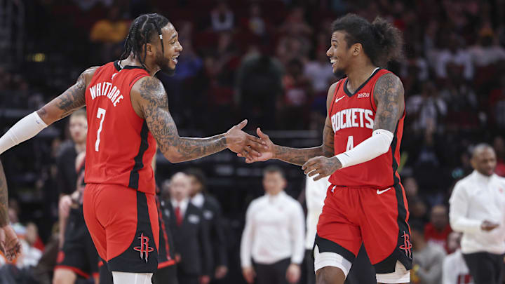 Feb 9, 2025; Houston, Texas, USA; Houston Rockets forward Cam Whitmore (7) and guard Jalen Green (4) celebrate after a play during the fourth quarter against the Toronto Raptors at Toyota Center. Mandatory Credit: Troy Taormina-Imagn Images