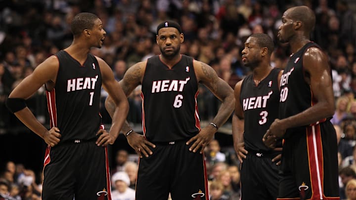 Nov 27, 2010; Dallas, TX, USA; Miami Heat forward Chris Bosh (1) Lebron James (6) guard Dwyane Wade and center Joel Anthony (50) during a break n the action from the game against the Dallas Mavericks at American Airlines Center. The Mavs beat the Heat 106-95. Mandatory Credit: Matthew Emmons-Imagn Images