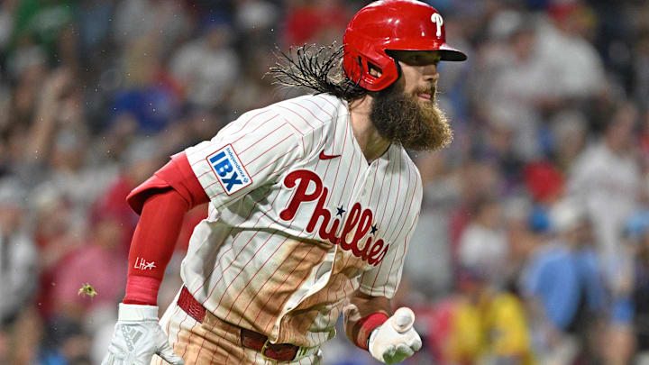 Apr 13, 2026; Philadelphia, Pennsylvania, USA; Philadelphia Phillies center fielder Brandon Marsh (16) watches his two RBI double against the Chicago Cubs during the fifth inning at Citizens Bank Park. Mandatory Credit: Eric Hartline-Imagn Images