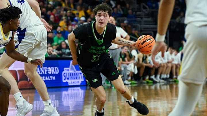 North Dakota Fighting Hawks guard Treysen Eaglestaff (52) moves the ball on Friday, March 7, 2025, at Denny Sanford Premier Center in Sioux Falls, S.D.