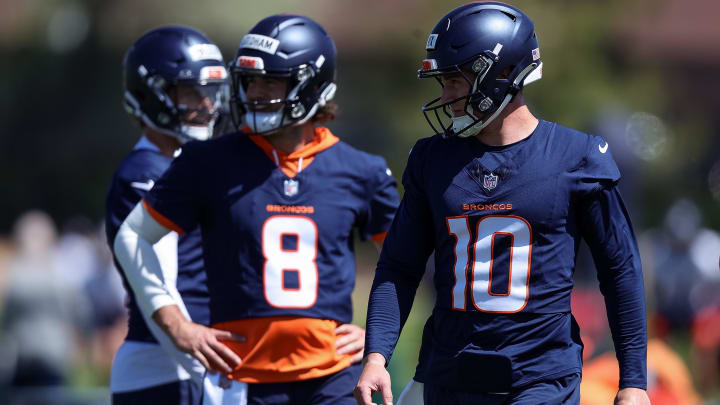 May 23, 2024; Englewood, CO, USA; Denver Broncos quarterback Bo Nix (10) and quarterback Jarrett Stidham (8) during organized team activities at Centura Health Training Center. 