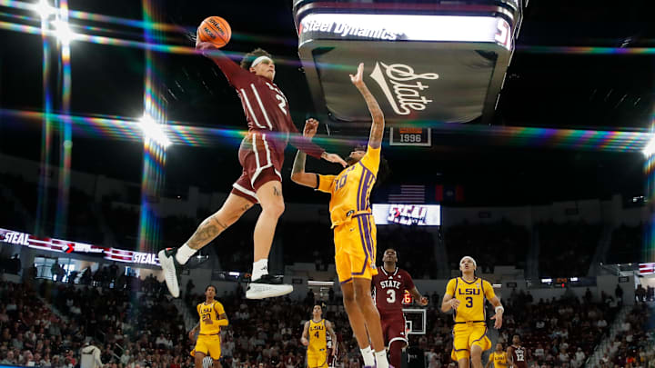 Mar 1, 2025; Starkville, Mississippi, USA; Mississippi State Bulldogs guard Riley Kugel (2) dunks the ball against LSU Tigers forward Daimion Collins (10) during the second half at Humphrey Coliseum. Mar 1, 2025; Starkville, Mississippi, USA; Mississippi State Bulldogs guard Riley Kugel (2) dunks the ball against LSU Tigers forward Daimion Collins (10) during the second half at Humphrey Coliseum.