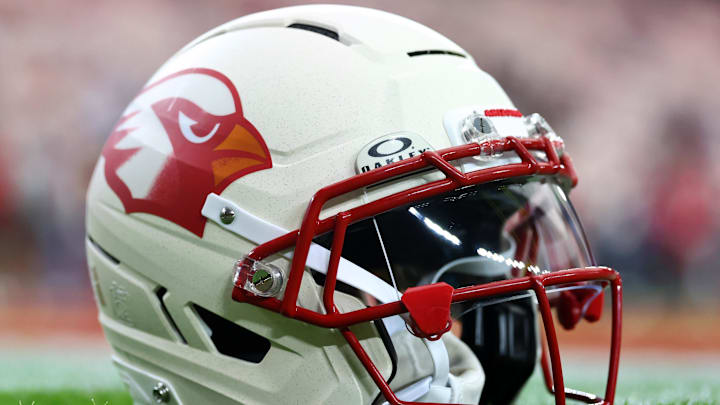 Sep 25, 2025; Glendale, Arizona, USA; Detail view of the Arizona Cardinals helmet on the field before the game against the Seattle Seahawks at State Farm Stadium. Mandatory Credit: Mark J. Rebilas-Imagn Images Sep 25, 2025; Glendale, Arizona, USA; Detail view of the Arizona Cardinals helmet on the field before the game against the Seattle Seahawks at State Farm Stadium. Mandatory Credit: Mark J. Rebilas-Imagn Images