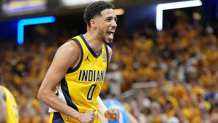 Indiana Pacers guard Tyrese Haliburton (0) reacts after a play against the Oklahoma City Thunder during the second half of Game 4 of the 2025 NBA Finals at Gainbridge Fieldhouse.