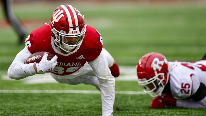 Indiana Hoosiers tight end Peyton Hendershot (86) dives away from Rutgers Scarlet Knights defensive back Shaquan Loyal (25) during the second half at Memorial Stadium. The Scarlet Knights won 38-3. Indiana Hoosiers tight end Peyton Hendershot (86) dives away from Rutgers Scarlet Knights defensive back Shaquan Loyal (25) during the second half at Memorial Stadium. The Scarlet Knights won 38-3.