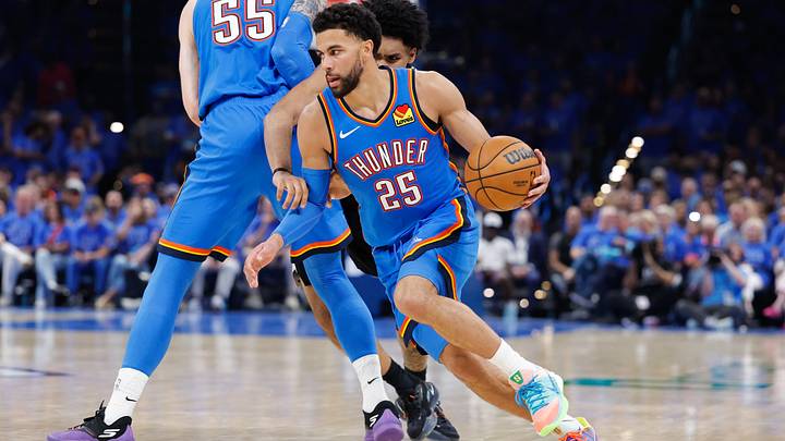 May 18, 2026; Oklahoma City, Oklahoma, USA; Oklahoma City Thunder guard Ajay Mitchell (25) drives the ball in the third quarter against the San Antonio Spurs during game one of the western conference finals for the 2026 NBA playoffs at Paycom Center. Mandatory Credit: Alonzo Adams-Imagn Images