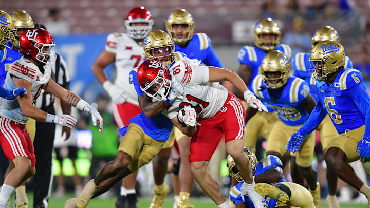 Aug 30, 2025; Pasadena, California, USA; Utah Utes tight end JJ Buchanan (81) runs the ball against the UCLA Bruins during the second half at Rose Bowl. Mandatory Credit: Gary A. Vasquez-Imagn Images