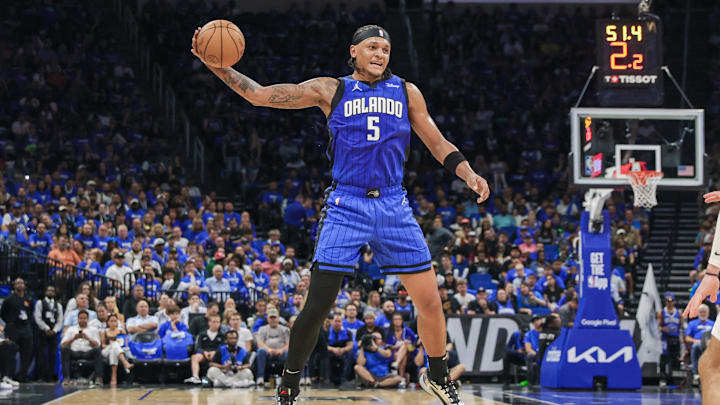 Orlando Magic forward Paolo Banchero (5) catches a pass against the Cleveland Cavaliers during the second quarter of game three of the first round for the 2024 NBA playoffs at Kia Center.