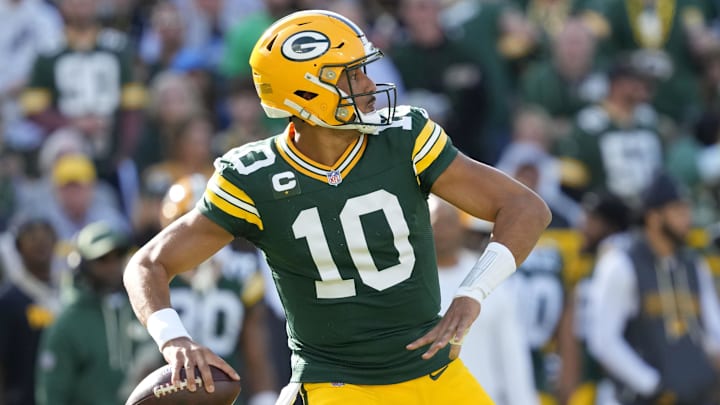Green Bay Packers quarterback Jordan Love (10) passes the ball against the Detroit Lions during the second quarter at Lambeau Field. Green Bay Packers quarterback Jordan Love (10) passes the ball against the Detroit Lions during the second quarter at Lambeau Field.