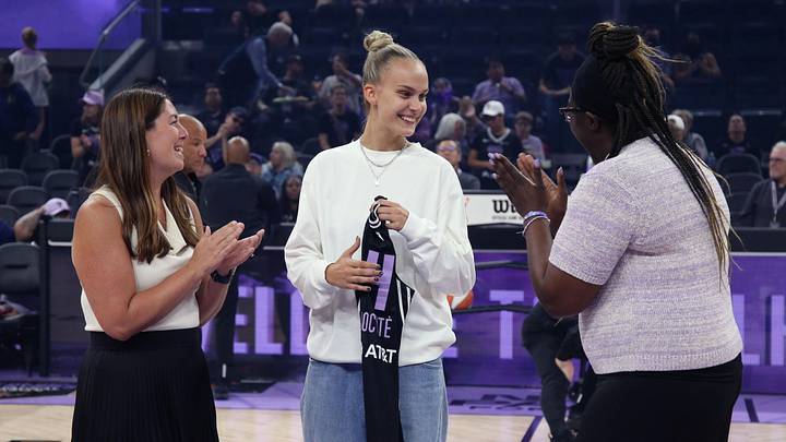 Aug 17, 2025; San Francisco, California, USA;  Golden State Valkyries president Jess Smith, 2025 number one draft pick (5th overall) Juste Jocyte, and general manager Ohemaa Nyanin share a laugh during a jersey presentation before the Atlanta Dream game at Chase Center. Mandatory Credit: David Gonzales-Imagn