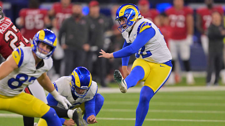 Nov 23, 2025; Inglewood, California, USA; Los Angeles Rams placekicker Harrison Mevis (92) kicks a forty-yard field goal held by punter Ethan Evans (42) against the Tampa Bay Buccaneers during the second quarter at SoFi Stadium. Mandatory Credit: Jayne Kamin-Oncea-Imagn Images
