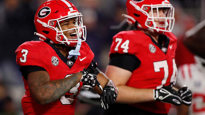 Georgia running back Andrew Paul (3) celebrate with his teammates after scoring a touchdown during Georgia running back Andrew Paul (3) celebrate with his teammates after scoring a touchdown during