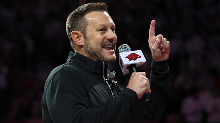 Arkansas Razorbacks new coach Ryan Silverfield speaks to the crowd during halftime against the Louisville Cardinals at Bud Walton Arena. 
