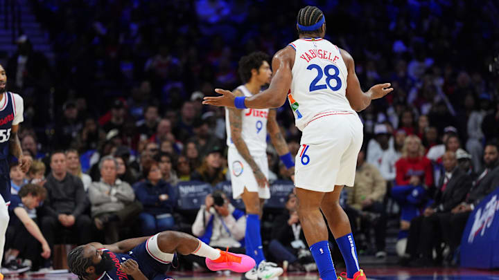 Nov 24, 2024; Philadelphia, Pennsylvania, USA; Philadelphia 76ers forward Guerschon Yabusele (28) reacts after committing a foul against Los Angeles Clippers guard James Harden (1) in the second quarter at Wells Fargo Center. Mandatory Credit: Kyle Ross-Imagn Images