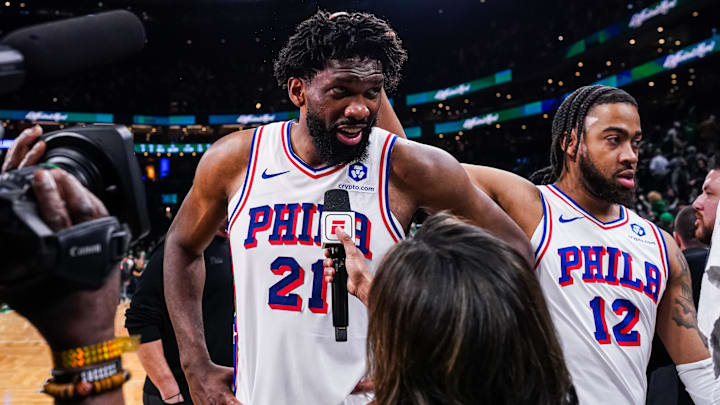 Apr 28, 2026; Boston, Massachusetts, USA; Philadelphia 76ers center Joel Embiid (21) and forward Trendon Watford (12) after the game against the Boston Celtics in game five of the first round of the 2026 NBA Playoffs at TD Garden. Mandatory Credit: David Butler II-Imagn Images