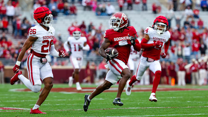 Apr 20, 2024; Norman, OK, USA;  Oklahoma Sooners wide receiver Deion Burks (6) catches a touchdown in annual OU Red-White Spring Game.