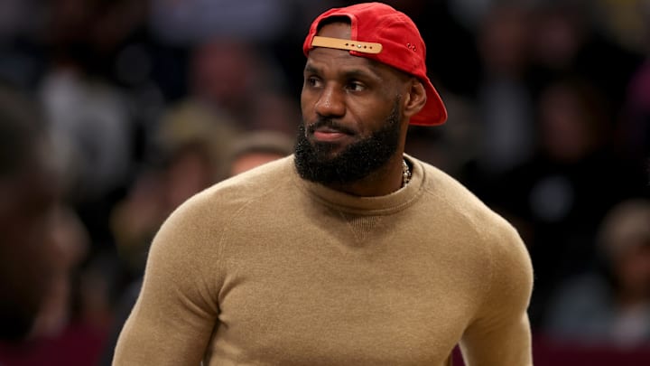 Los Angeles Lakers injured forward LeBron James (23) on the court during a time out during the first quarter against the Brooklyn Nets at Barclays Center.