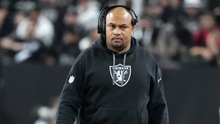Dec 16, 2024; Paradise, Nevada, USA; Las Vegas Raiders coach Antonio Pierce watches from the sidelines against the Atlanta Falcons in the first half at Allegiant Stadium. Mandatory Credit: Kirby Lee-Imagn Images
