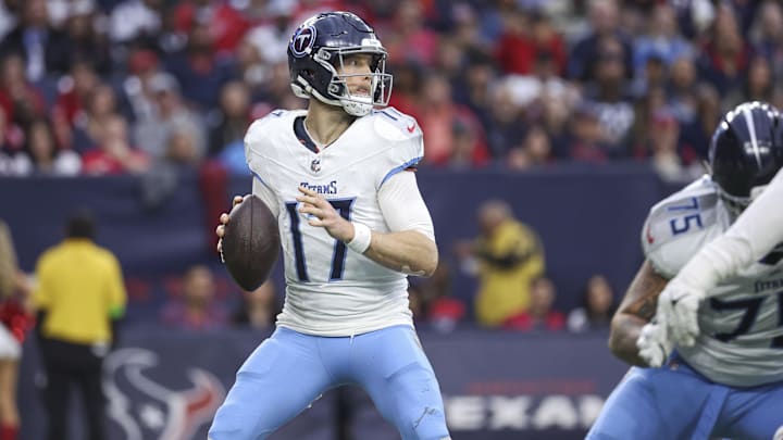 Dec 31, 2023; Houston, Texas, USA; Tennessee Titans quarterback Ryan Tannehill (17) looks for an open receiver during the fourth quarter against the Houston Texans at NRG Stadium.