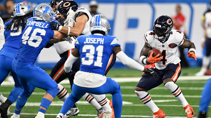 D'Andre Swift looks for an opening on a carry early against the Detroit Lions in a 52-21 loss.
