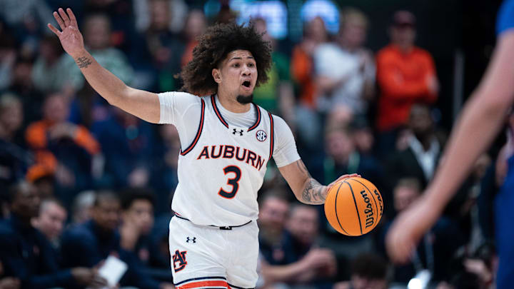 Auburn Tigers guard Tre Donaldson (3) calls a play against Florida during the SEC Men's Basketball Championship.