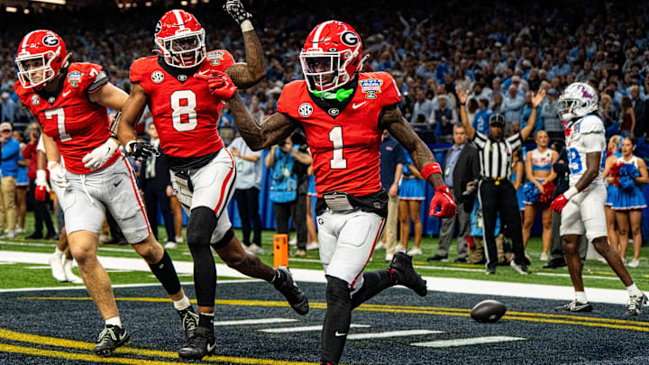 Georgia wide receiver Zachariah Branch (1) celebrates with wide receiver Colbie Young (8) after scoring a touchdown during the Sugar Bowl and College Football Playoff quarterfinals at Caesars Superdome in New Orleans, La., on Thursday, Jan. 1, 2026. Ole Miss defeated Georgia 39-34. Georgia wide receiver Zachariah Branch (1) celebrates with wide receiver Colbie Young (8) after scoring a touchdown during the Sugar Bowl and College Football Playoff quarterfinals at Caesars Superdome in New Orleans, La., on Thursday, Jan. 1, 2026. Ole Miss defeated Georgia 39-34.