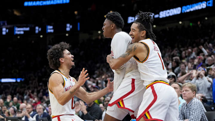 Maryland's Derik Queen celebrates with teammates after scoring the game-winning shot against Colorado State.