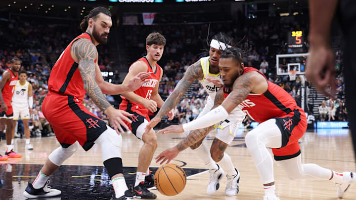 Oct 7, 2024; Salt Lake City, Utah, USA; Utah Jazz guard Jordan Clarkson (00) battles Houston Rockets center Steven Adams (12) guard Reed Sheppard (15) and forward Cam Whitmore (7) for a loose ball during the first quarter at Delta Center. Mandatory Credit: Rob Gray-Imagn Images Oct 7, 2024; Salt Lake City, Utah, USA; Utah Jazz guard Jordan Clarkson (00) battles Houston Rockets center Steven Adams (12) guard Reed Sheppard (15) and forward Cam Whitmore (7) for a loose ball during the first quarter at Delta Center. Mandatory Credit: Rob Gray-Imagn Images