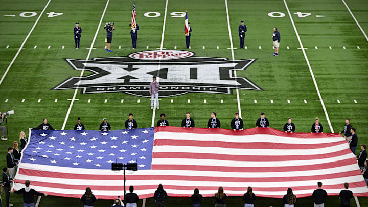 Dec 7, 2024; Arlington, TX, USA; A view of the Big 12 logo and American flag before the game between the Iowa State Cyclones and the Arizona State Sun Devils at AT&T Stadium. Mandatory Credit: Jerome Miron-Imagn Images