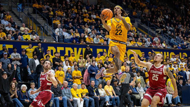 Cal's Chris Bell soars over Stanford defenders Cal's Chris Bell soars over Stanford defenders